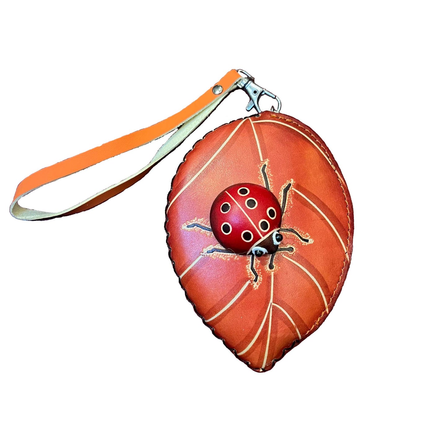 foglia porta chiavi in pelle arancione artigianale accessorio in cuoio made in italy cuoieria italiana