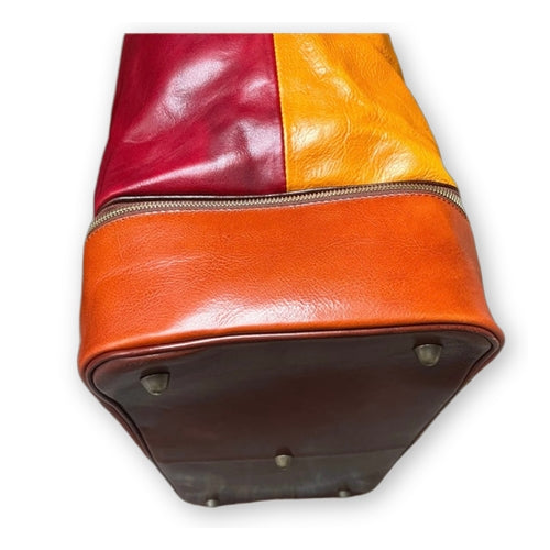 Travel bag with double bottom in multicolor leather