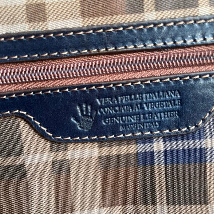 Blue leather carry-on bag