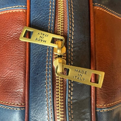 Blue leather carry-on bag