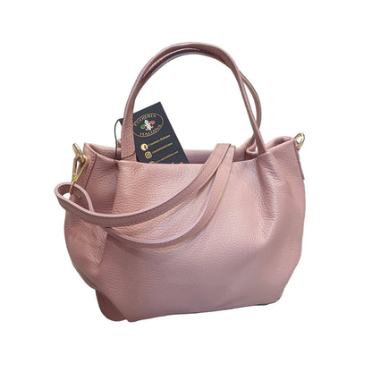 baulotto a mano in vitello martellato da donna borsa in pelle rosa chiaro fatta a mano made in italy cuoieria italiana
