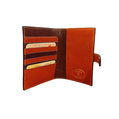 interno traveller porta passaporto premium in cuoio arancione e marrone artigianale accessorio in pelle made in italy cuoieria italiana