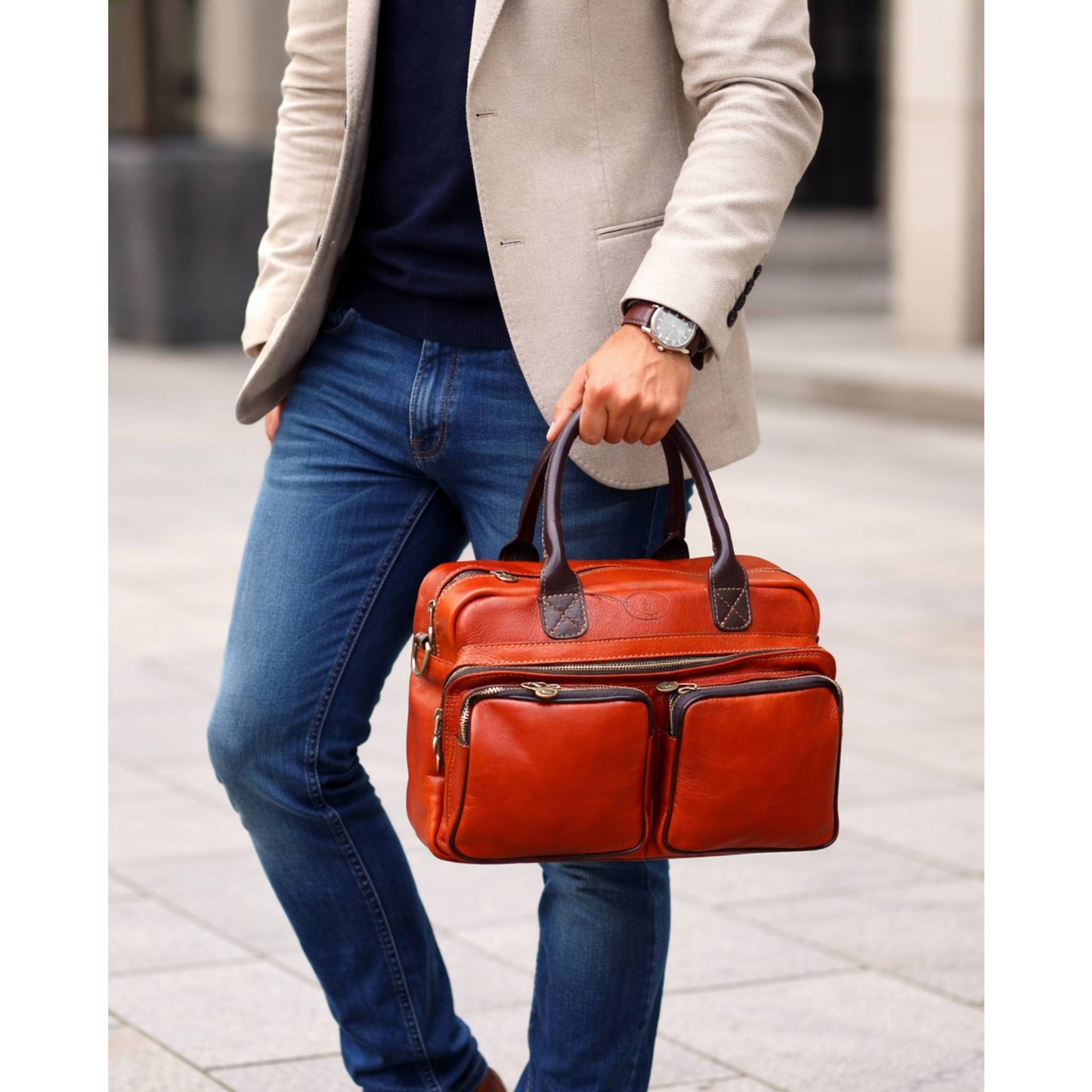 modello a mano testuggine borsa cartella arancione da lavoro compatta in pelle artigianale made in italy cuoieria italiana