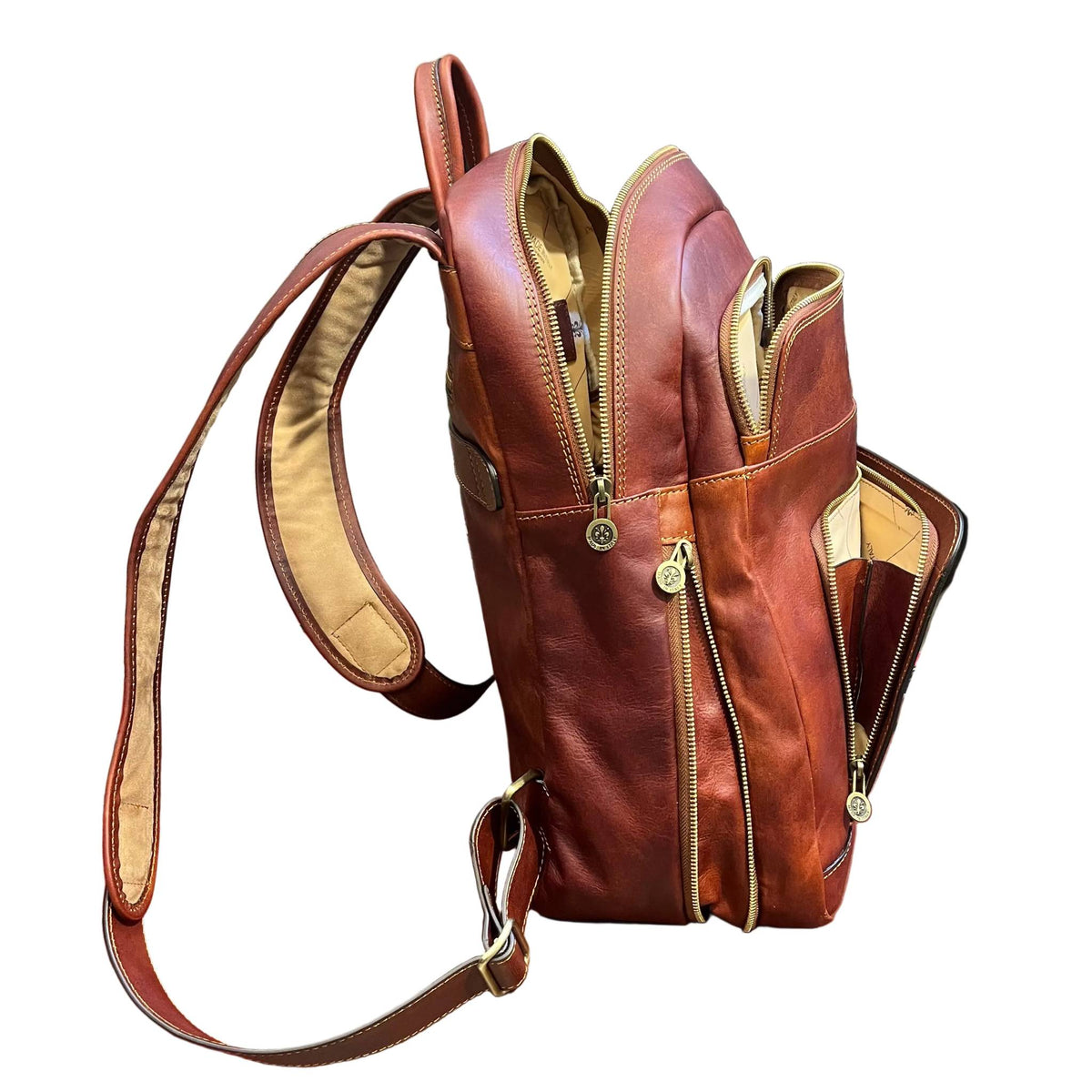profilo aperto lato destro sagittarius zaino grande espandibile in pelle marrone mogano borsa in cuoio fatta a mano made in italy cuoieria italiana®