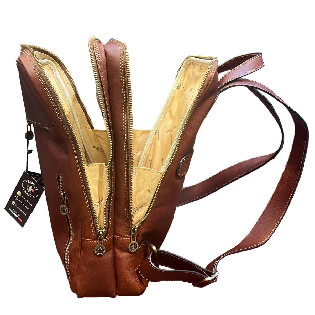 profilo lato larghezza aperto deimos zaino porta pc in pelle marrone mogano zaino compatto fatto a mano in cuoio made in italy cuoieria italiana®