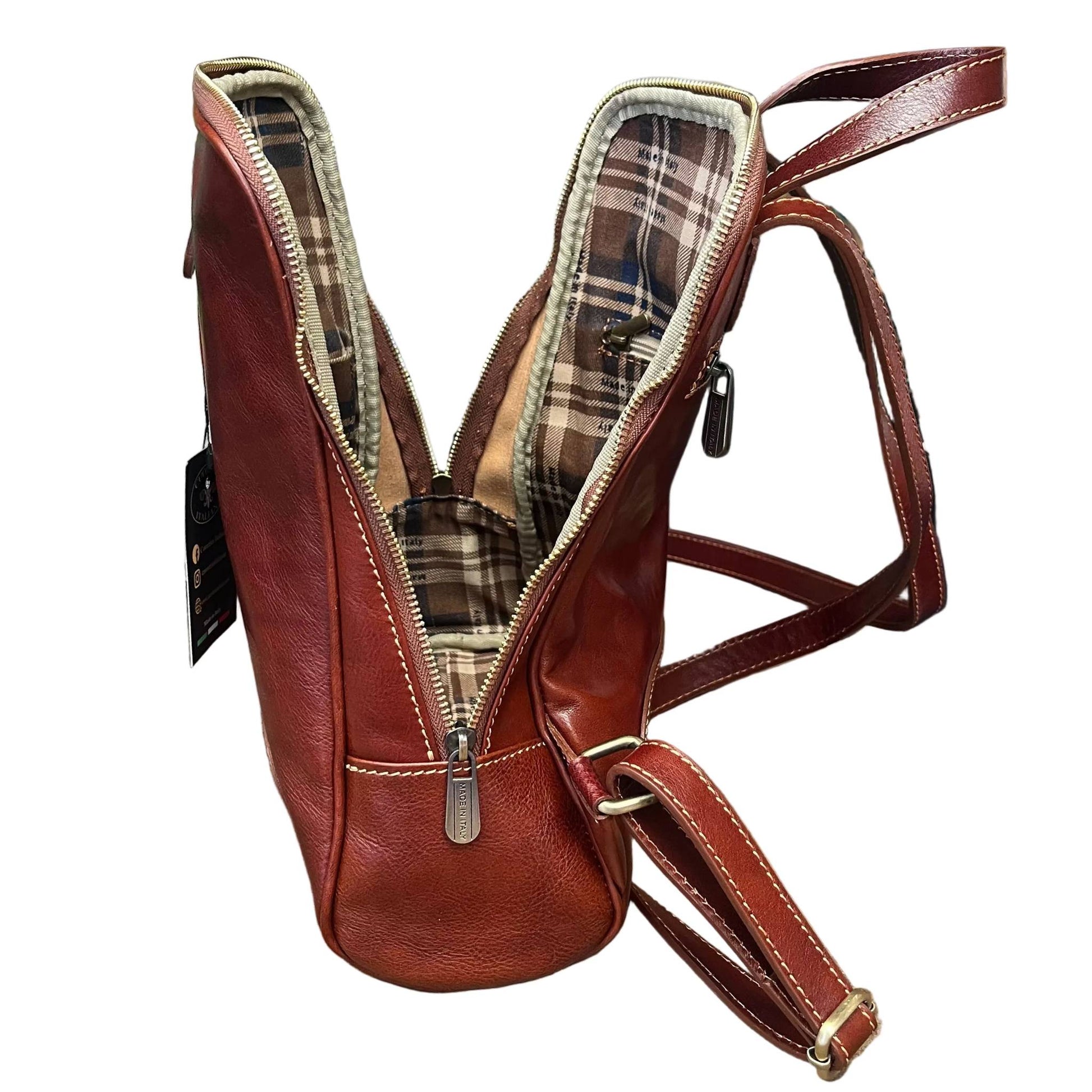 profilo lato larghezza aperto foglia zaino compatto in pelle marrone borsa in cuoio fatta a mano made in italy cuoieria italiana ®