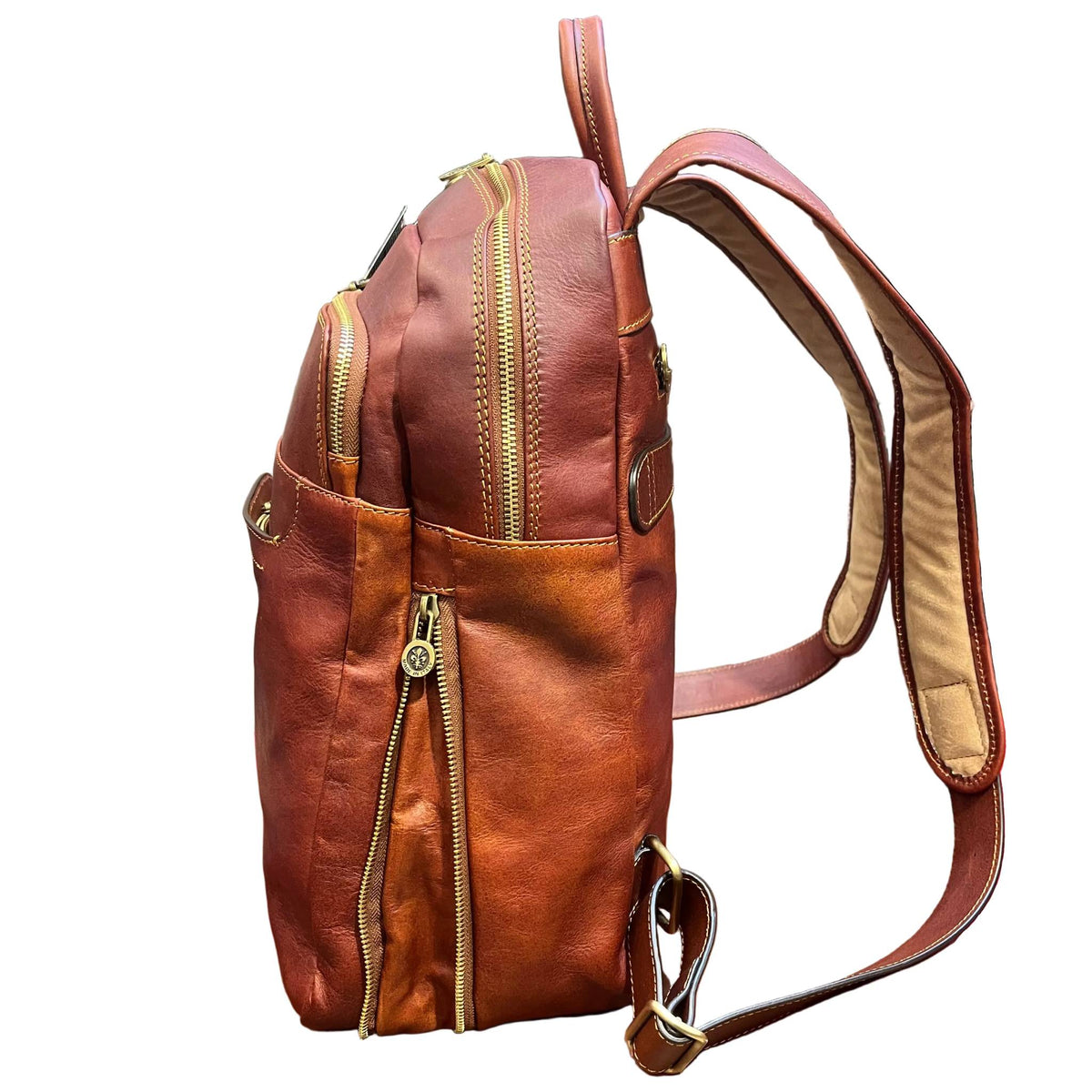 profilo lato larghezza aperto sagittarius zaino grande espandibile in pelle marrone mogano borsa in cuoio fatta a mano made in italy cuoieria italiana®