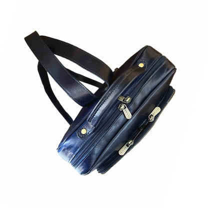 sopra e maniglia zaino grande compatto in pelle blu borsa in cuoio made in italy cuoieria italiana