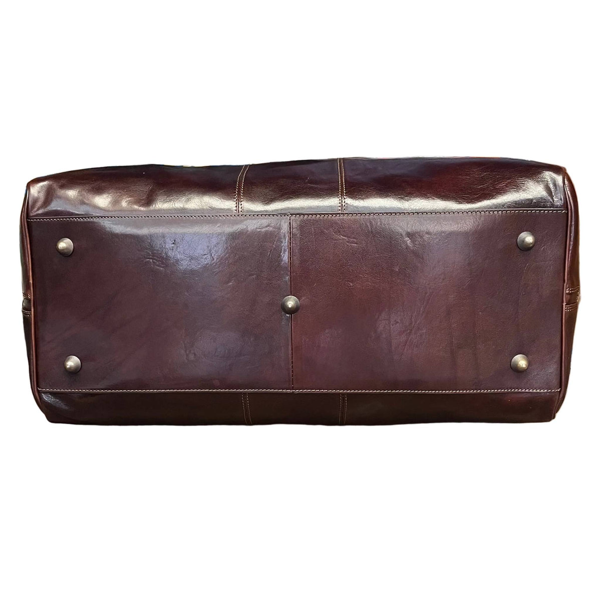 sotto base e piedini metallici borsone in pelle marrone testa di moro bagaglio a mano in cuoio fatto a mano made in italy cuoieria italiana ®