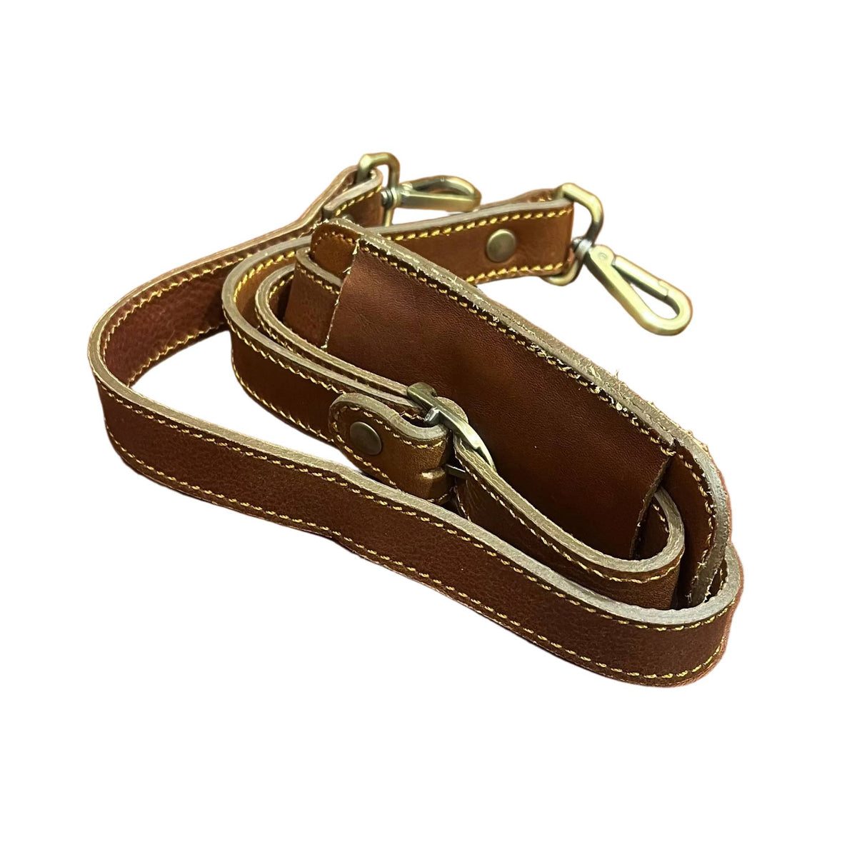 tracolla in pelle cuoio dettagli fibbia e moschettone in ferro metallo corvus valigia in cuoio da bagaglio a mano trolley fatto a mano in pelle marrone classico made in italy cuoieria italiana®